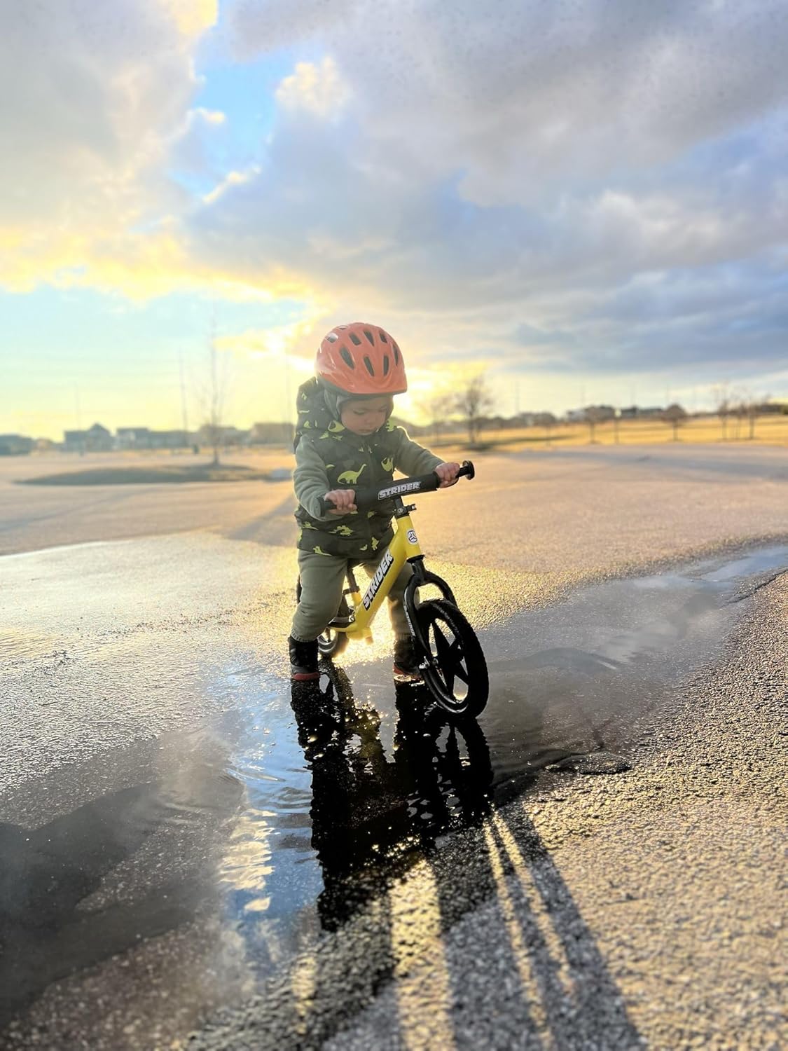 Strider 12” Sport Bike - No Pedal Balance Bicycle for Kids 1 to 4 Years - Includes Safety Pad, Padded Seat, Mini Grips & Flat-Free Tires - Tool-Free Assembly & Adjustments