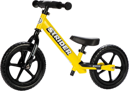 Strider 12” Sport Bike - No Pedal Balance Bicycle for Kids 1 to 4 Years - Includes Safety Pad, Padded Seat, Mini Grips & Flat-Free Tires - Tool-Free Assembly & Adjustments
