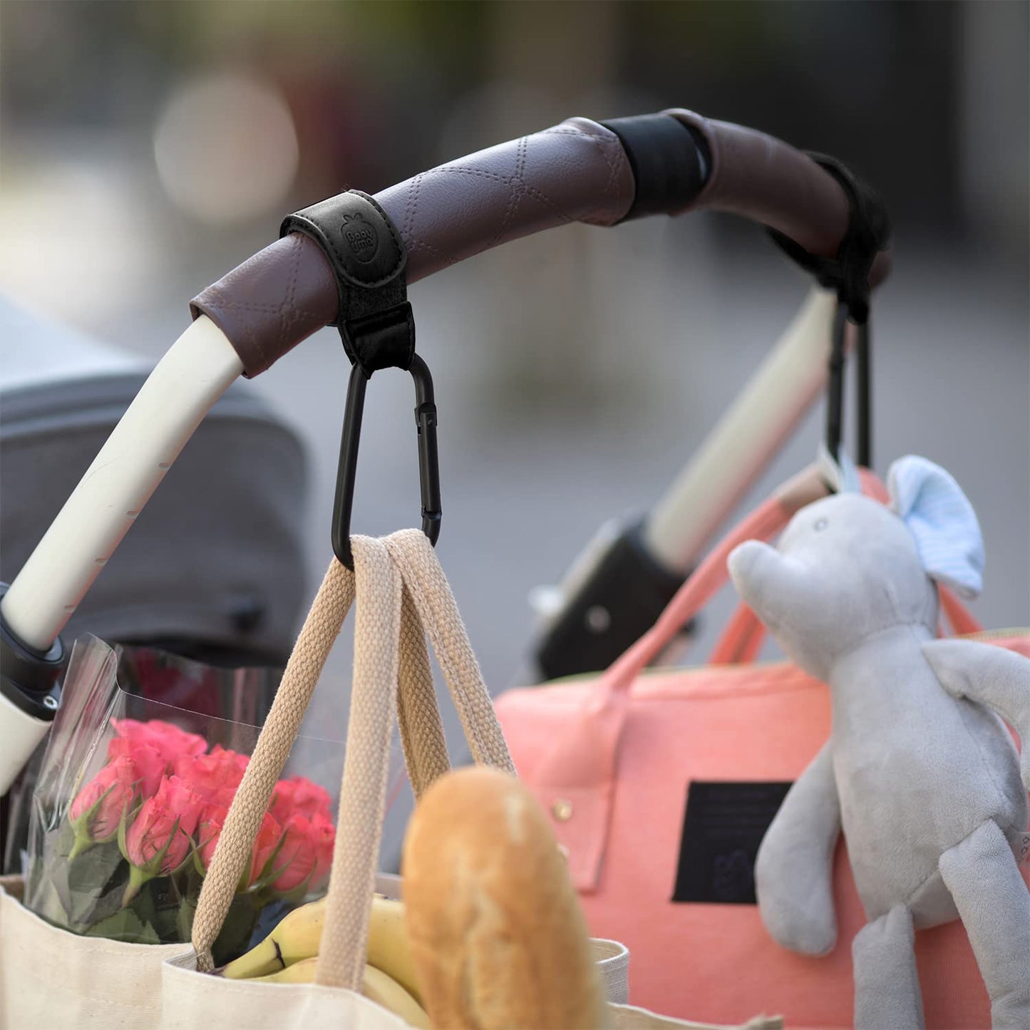 Baby Uma Stroller Hooks for Bags (2 Pack) - Faux-Leather Stroller Clips and Hooks, Universal, 11 lb Weight Capacity per Carabiner, Adjustable & Non-Slip, Baby Travel Essential (Black)