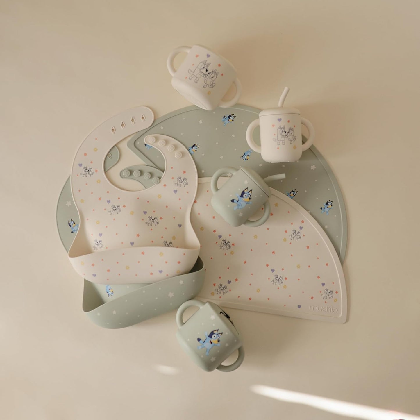 mushie x Bluey Silicone Baby Bib | Adjustable Fit Waterproof Bibs (Bluey Sage)