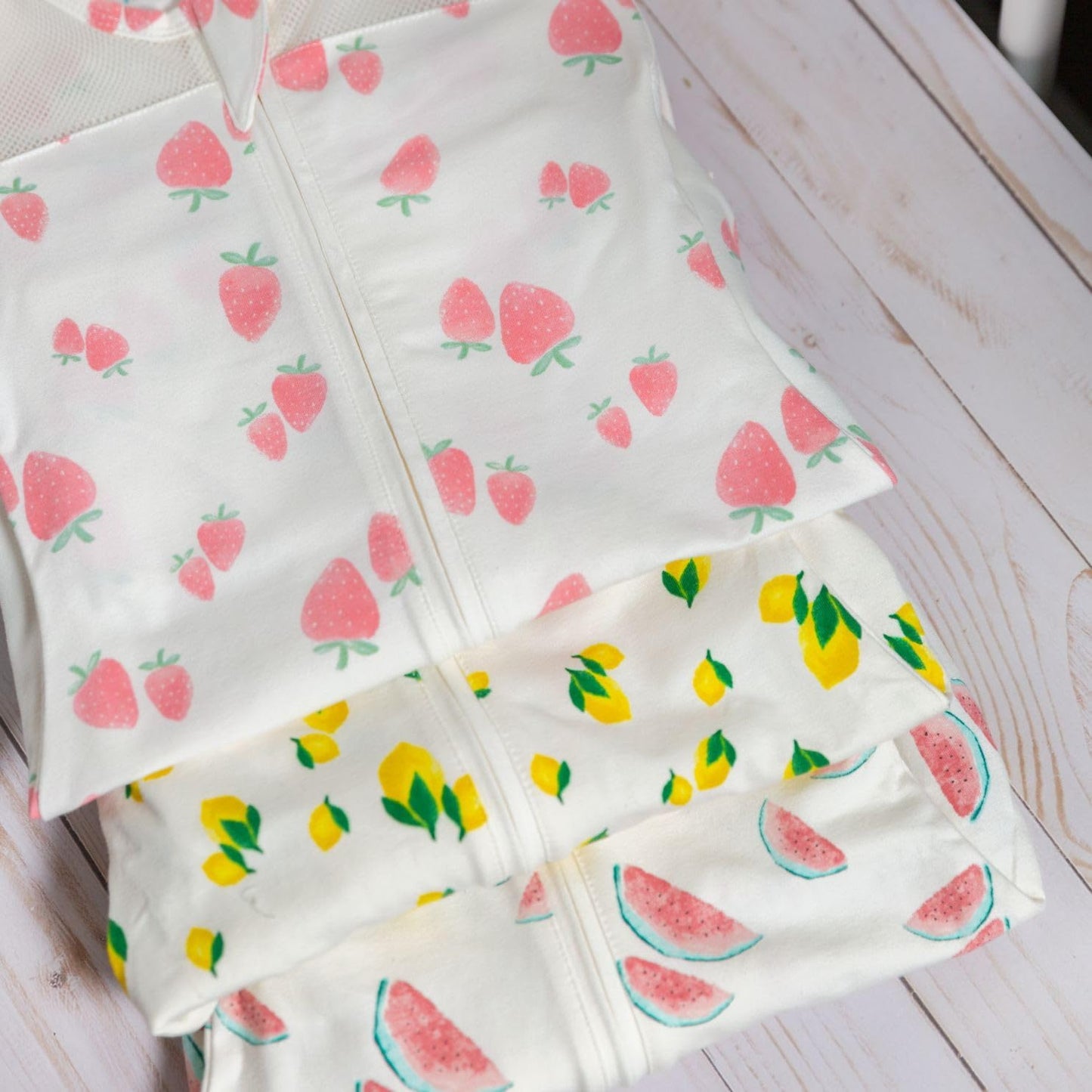 Happiest Baby SNOO Sleep Sack - 100% Organic Cotton Baby Swaddle Blanket - Doctor Designed Promotes Healthy Hip Development (Ivory Lemons, Medium)