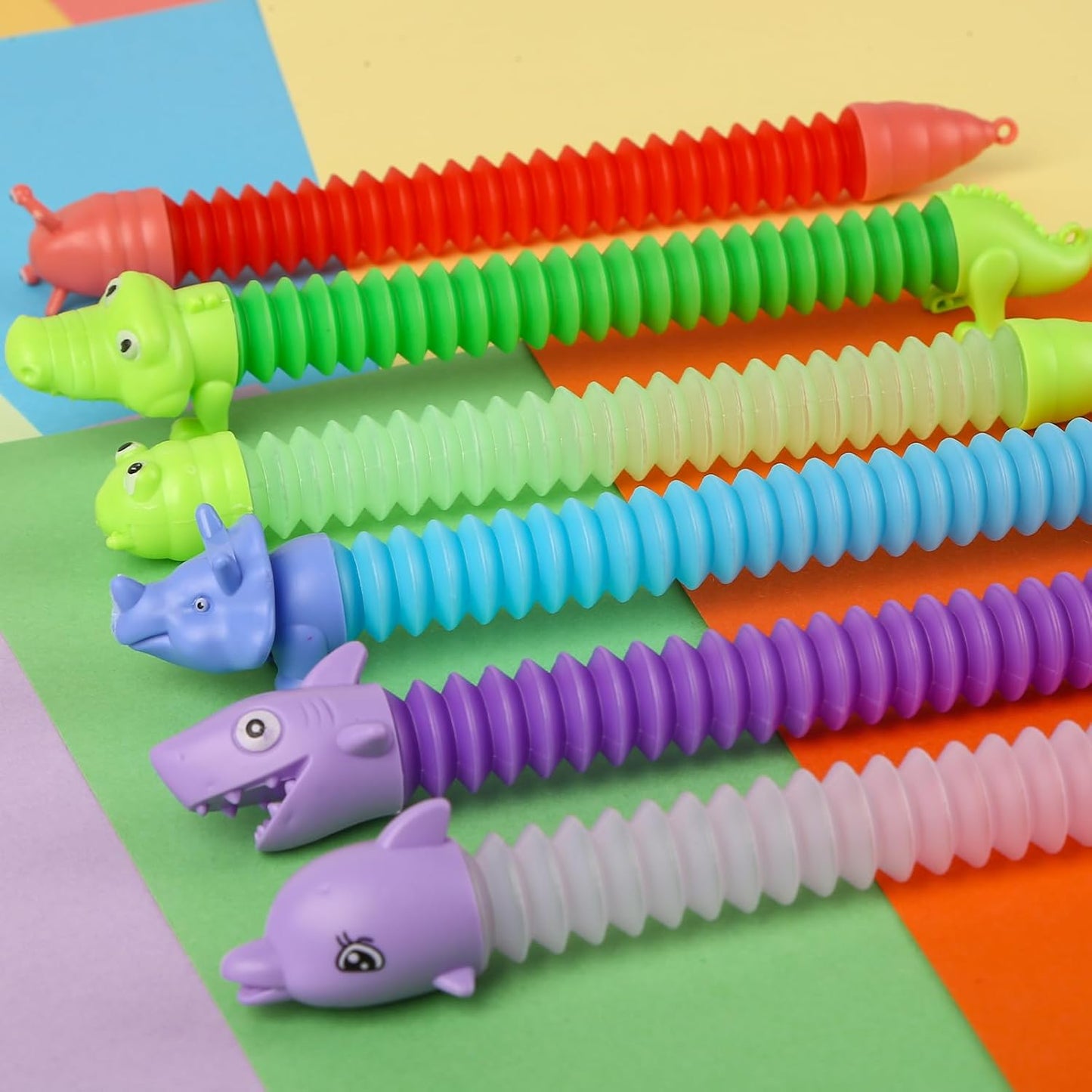 Shindel 8PCS Pop Tubes, Stress Relief Pop Tubes Mini Sensory Fidget Toys Dinosaurs Dolphins for Autism Kids Stocking Stuffers Classroom Treasure Box Prizes Goodie Bag Stuffers